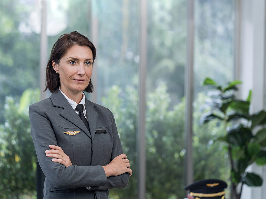 Professional woman in pilot uniform